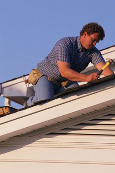 Roofing contractor: Call for a new roof or repair!